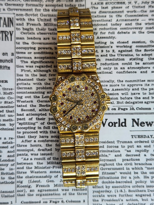 Chopard St. Moritz 18kt Factory diamond and Ruby Lady watch.